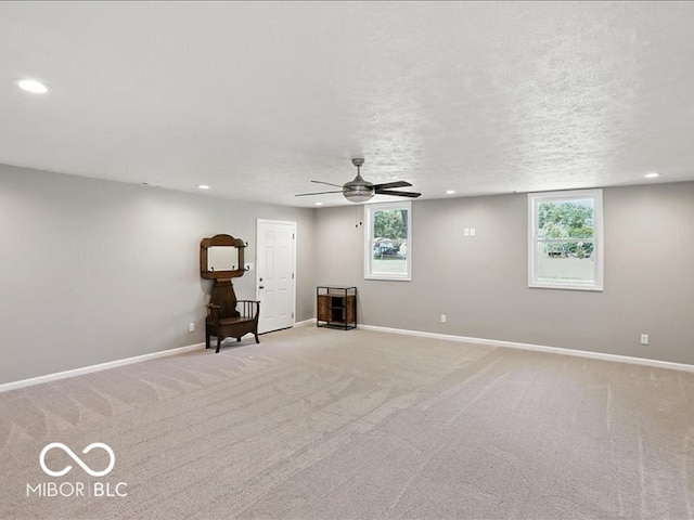 11093 N Pheasant Run, Fairland, IN 46126 - spare room with recessed lighting, a ceiling fan, and light carpet