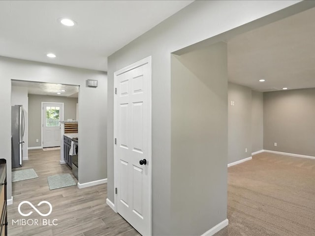 11093 N Pheasant Run, Fairland, IN 46126 - corridor with recessed lighting and light wood-type flooring