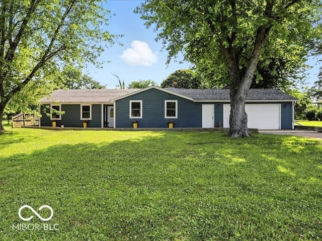 11093 N Pheasant Run, Fairland, IN 46126 - ranch-style home with driveway, a front lawn, and an attached garage