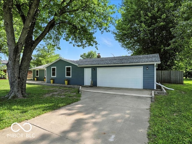 11093 N Pheasant Run, Fairland, IN 46126 - single story home featuring an attached garage, a chimney, and concrete driveway