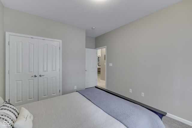 1454 Heron Ridge Blvd, Greenwood, IN 46143 - carpeted bedroom with a closet and baseboards