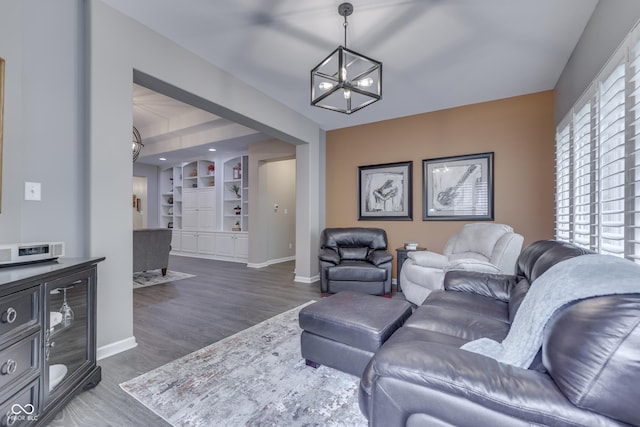 1454 Heron Ridge Blvd, Greenwood, IN 46143 - living area with a chandelier, wood finished floors, and built in features