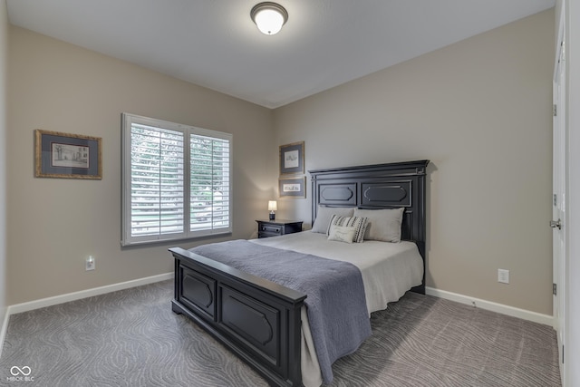 1454 Heron Ridge Blvd, Greenwood, IN 46143 - bedroom with dark carpet and baseboards
