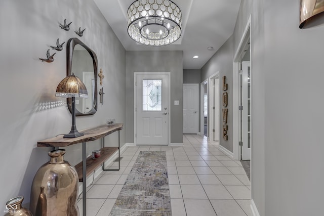 1454 Heron Ridge Blvd, Greenwood, IN 46143 - entrance foyer with light tile patterned floors, a chandelier, and recessed lighting