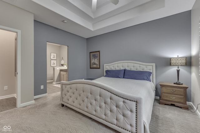 1454 Heron Ridge Blvd, Greenwood, IN 46143 - bedroom with carpet floors, ensuite bath, and a tray ceiling