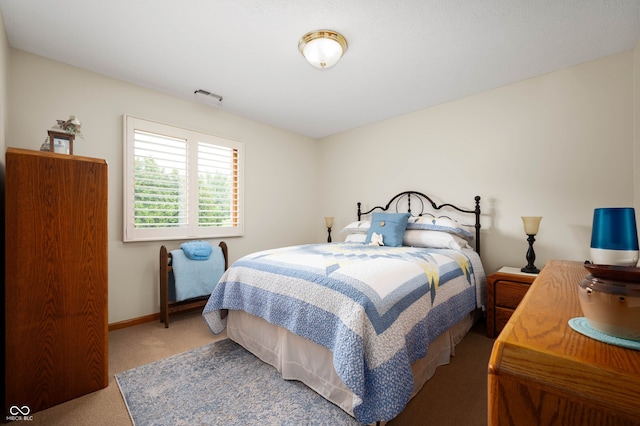 114 Asbury Dr, Anderson, IN 46013 - bedroom featuring carpet and baseboards