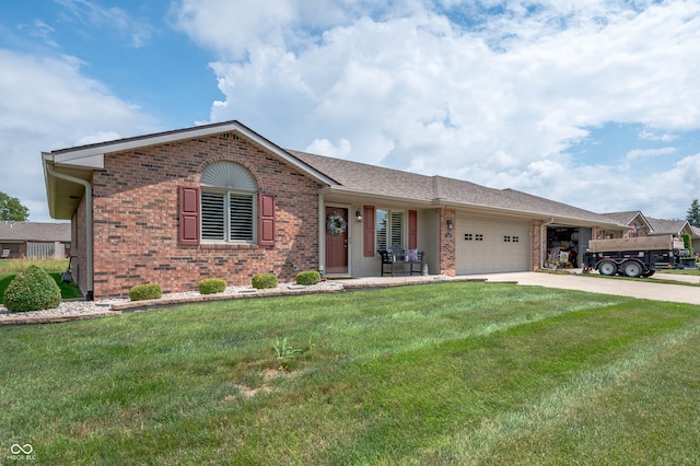 114 Asbury Dr, Anderson, IN 46013 - single story home with brick siding, driveway, an attached garage, and a front lawn