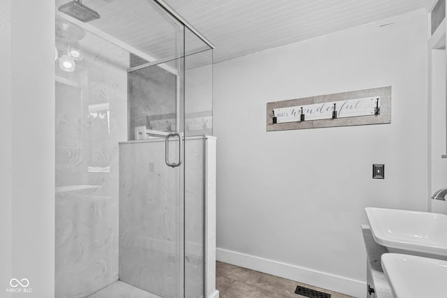 6092 N Jack Morgan Rd, Austin, IN 47102 - bathroom featuring a sink and a marble finish shower