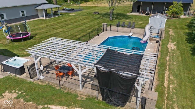 6092 N Jack Morgan Rd, Austin, IN 47102 - view of pool featuring a water slide, a trampoline, a patio, and a pergola