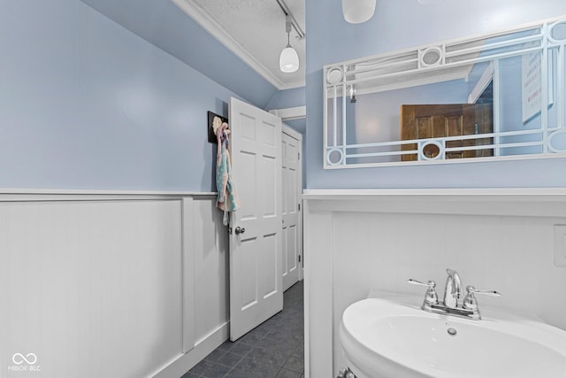 6092 N Jack Morgan Rd, Austin, IN 47102 - bathroom with crown molding and wainscoting