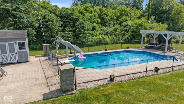 6092 N Jack Morgan Rd, Austin, IN 47102 - view of pool with outdoor lounge area, a storage shed, a water slide, a diving board, and a patio area