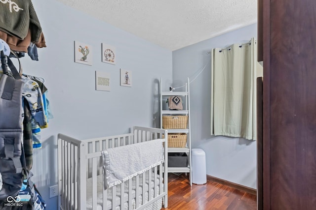 6092 N Jack Morgan Rd, Austin, IN 47102 - bedroom featuring wood finished floors and a textured ceiling