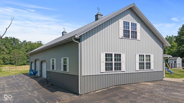 6092 N Jack Morgan Rd, Austin, IN 47102 - view of side of home with a chimney