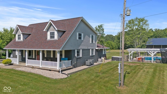 6092 N Jack Morgan Rd, Austin, IN 47102 - rear view of house with a lawn and a shingled roof