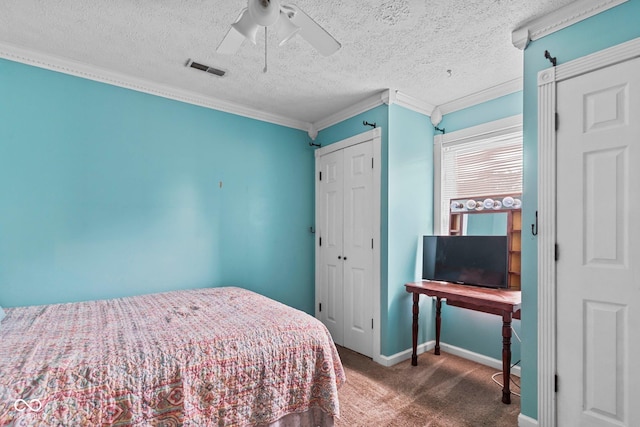 6092 N Jack Morgan Rd, Austin, IN 47102 - carpeted bedroom featuring ornamental molding, a closet, ceiling fan, and a textured ceiling