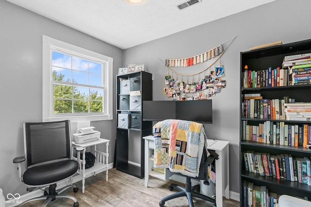 6092 N Jack Morgan Rd, Austin, IN 47102 - office area featuring wood finished floors and baseboards