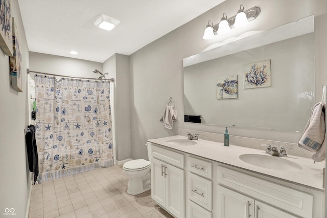4596 Peabody Way, Westfield, IN 46062 - bathroom featuring a shower with shower curtain, double vanity, and recessed lighting