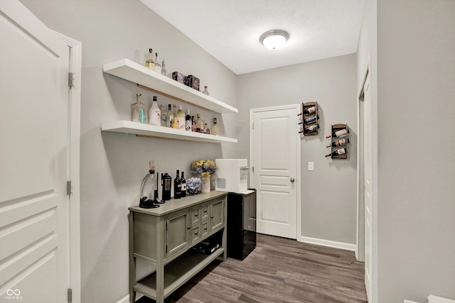 4596 Peabody Way, Westfield, IN 46062 - hallway with dark wood-style floors and baseboards