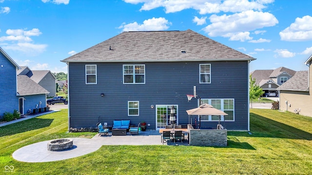 4596 Peabody Way, Westfield, IN 46062 - back of property featuring an outdoor living space with a fire pit, a patio, a lawn, and a shingled roof