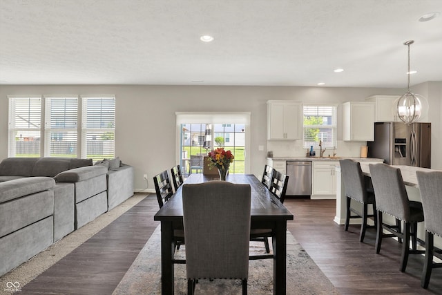 4596 Peabody Way, Westfield, IN 46062 - dining room featuring recessed lighting, dark wood-style flooring, and a chandelier