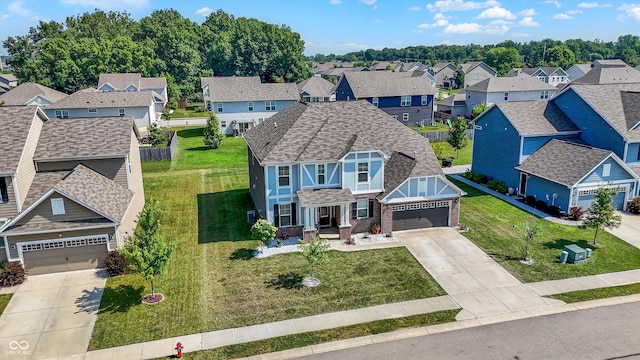 4596 Peabody Way, Westfield, IN 46062 - view of front facade with driveway, a residential view, a garage, and a front yard