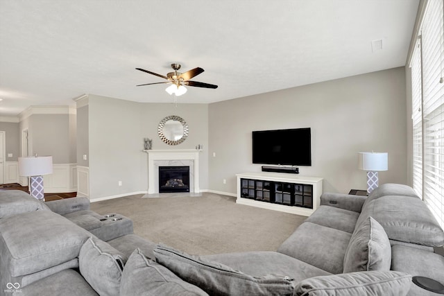 4596 Peabody Way, Westfield, IN 46062 - living room with carpet floors, plenty of natural light, a ceiling fan, and a premium fireplace