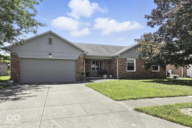 1011 Stevedon Ct, Plainfield, IN 46168 - ranch-style house with brick siding, a front lawn, driveway, an attached garage, and roof with shingles