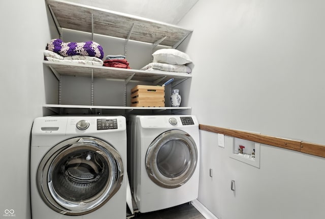 1011 Stevedon Ct, Plainfield, IN 46168 - laundry room featuring washer / dryer and wood finished floors