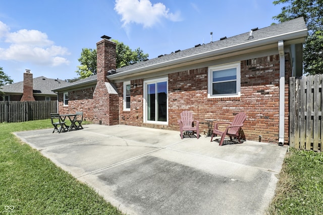 1011 Stevedon Ct, Plainfield, IN 46168 - back of property featuring brick siding, a patio, and a chimney