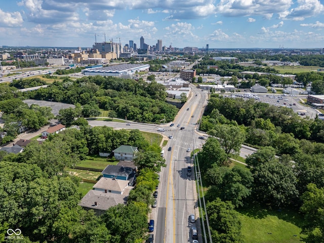 aerial overview of property's location with a main thoroughfare and nearby urban area