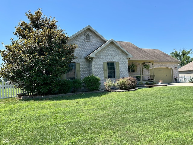 2080 Galway Trl N, Madison, IN 47250 - view of front of home with a garage, brick siding, and driveway