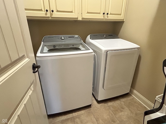 2080 Galway Trl N, Madison, IN 47250 - laundry area with cabinet space and independent washer and dryer