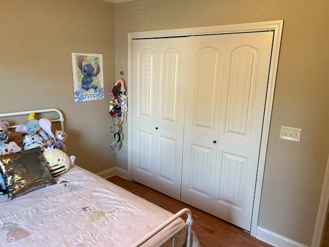 2080 Galway Trl N, Madison, IN 47250 - bedroom with a closet and wood finished floors