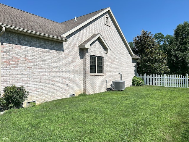 2080 Galway Trl N, Madison, IN 47250 - view of side of property featuring a shingled roof, brick siding, and crawl space