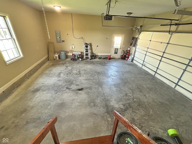2080 Galway Trl N, Madison, IN 47250 - garage featuring a garage door opener and electric panel