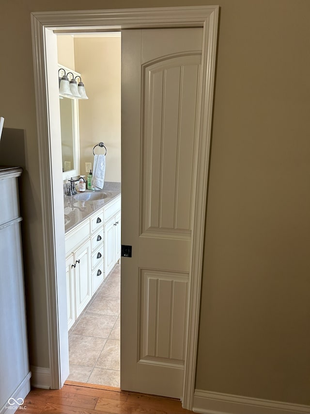 2080 Galway Trl N, Madison, IN 47250 - bathroom with vanity and wood finished floors