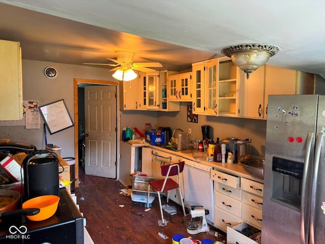 1510 E Locust St, Petersburg, IN 47567 - kitchen featuring stainless steel refrigerator with ice dispenser, a ceiling fan, dark wood finished floors, light countertops, and glass insert cabinets