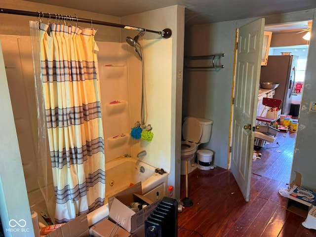 1510 E Locust St, Petersburg, IN 47567 - bathroom featuring radiator heating unit, wood-type flooring, and shower / tub combo with curtain