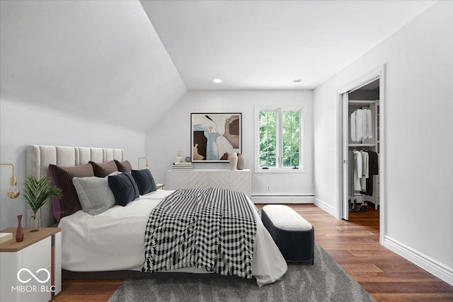 6470 Around The Hills Rd, Indianapolis, IN 46226 - bedroom featuring wood finished floors, baseboard heating, vaulted ceiling, and recessed lighting