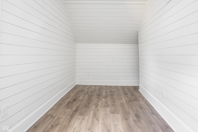 1456 Fletcher Ave, Indianapolis, IN 46203 - spare room with wooden walls and hardwood / wood-style flooring