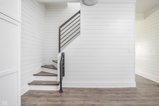 1456 Fletcher Ave, Indianapolis, IN 46203 - stairway with wooden walls and wood finished floors