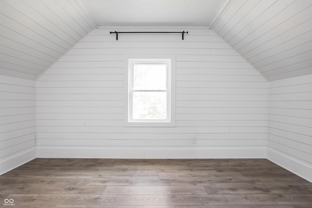 1456 Fletcher Ave, Indianapolis, IN 46203 - additional living space featuring vaulted ceiling and dark wood-style flooring