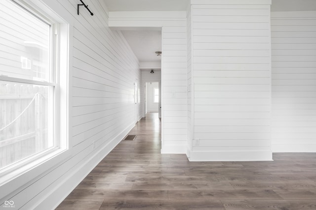 1456 Fletcher Ave, Indianapolis, IN 46203 - corridor featuring wood walls and dark wood-style flooring