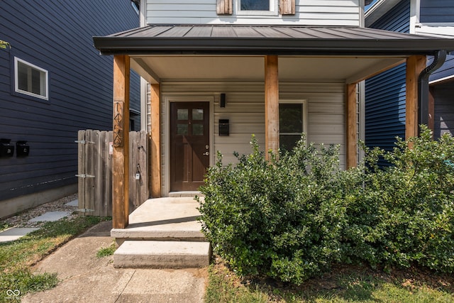 1456 Fletcher Ave, Indianapolis, IN 46203 - view of exterior entry with a standing seam roof and a metal roof
