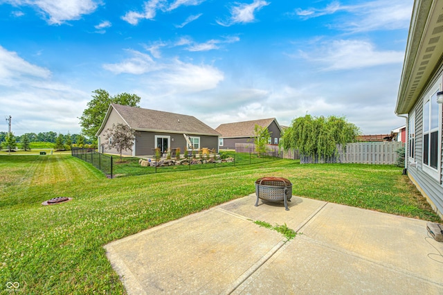 1270 W Limestone Way, Fortville, IN 46040 - fenced backyard featuring a fire pit and a patio