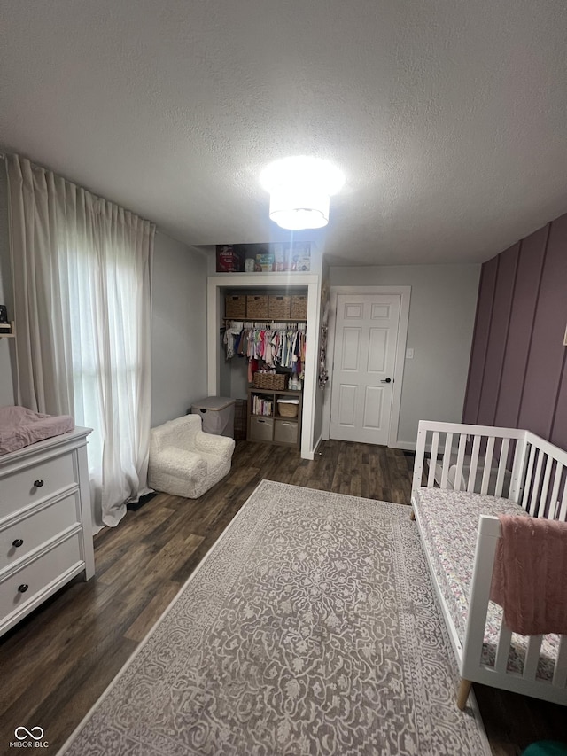 1203 S 6th St, Clinton, IN 47842 - bedroom with a textured ceiling, wood finished floors, and a closet