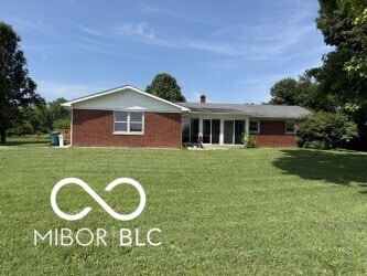 4680 Cartersburg Rd, Plainfield, IN 46168 - rear view of property with a lawn