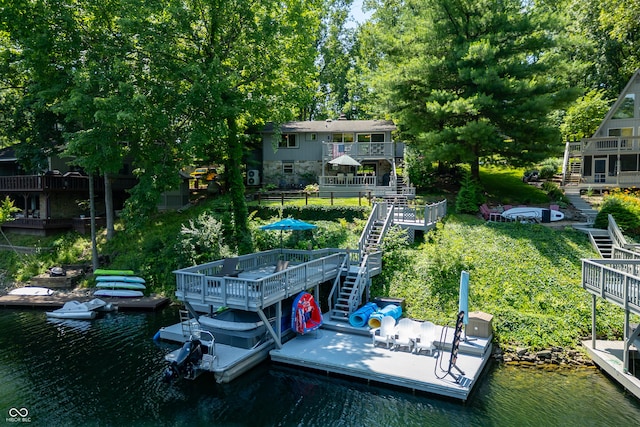 6254 Grosbeak Ct, Nineveh, IN 46164 - dock featuring stairway, a deck with water view, and view of scattered trees