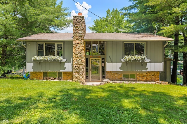 6254 Grosbeak Ct, Nineveh, IN 46164 - raised ranch with a chimney, a front lawn, and stone siding