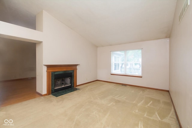 4625 Pine Park Ln, Indianapolis, IN 46268 - unfurnished living room with vaulted ceiling, carpet floors, and a high end fireplace